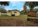 Large backyard with detached shed and space for outdoor activities at 221 S Johns St, Mount Dora, FL 32757