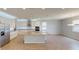 Spacious kitchen with granite countertops and stainless steel appliances at 2232 Juniper Berry Dr, Minneola, FL 34715