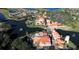 Resort-style community with lake and buildings at 233 Monterey St, Kissimmee, FL 34759