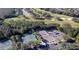 Aerial view of tennis courts and golf course at 233 Monterey St, Kissimmee, FL 34759