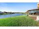 Spacious backyard with lush grass and lake view at 233 Monterey St, Kissimmee, FL 34759