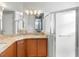 Bathroom features a large vanity with granite countertops and a shower at 233 Monterey St, Kissimmee, FL 34759