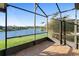 Enjoy the lake view from this screened porch at 233 Monterey St, Kissimmee, FL 34759