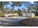 Charming single story home with attached garage and a large private driveway at 2937 Eagles Nest Rd, Fruitland Park, FL 34731