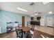 Efficient kitchen with dark cabinets and ample counter space at 2937 Eagles Nest Rd, Fruitland Park, FL 34731