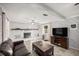 Spacious living room featuring a fireplace and comfy seating at 2937 Eagles Nest Rd, Fruitland Park, FL 34731