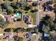 Aerial view showcasing house and neighborhood setting at 305 W Lady Lake Blvd, Lady Lake, FL 32159