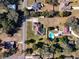 Aerial view showcasing house and neighborhood setting at 305 W Lady Lake Blvd, Lady Lake, FL 32159