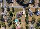Aerial view showcasing house and neighborhood setting at 305 W Lady Lake Blvd, Lady Lake, FL 32159