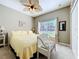 Bright bedroom with a queen-size bed and ceiling fan at 305 W Lady Lake Blvd, Lady Lake, FL 32159