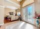 Bright and spacious entryway with tiled floors and stained glass doors at 305 W Lady Lake Blvd, Lady Lake, FL 32159
