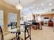 Kitchen with breakfast nook, island, and view into living room at 305 W Lady Lake Blvd, Lady Lake, FL 32159