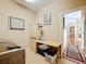 Laundry room with access to hallway and storage at 305 W Lady Lake Blvd, Lady Lake, FL 32159