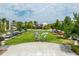 Community park with a butterfly sculpture, landscaping and shops at 3150 Voyager Ave, St Cloud, FL 34771