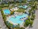 A bird's-eye view of a community pool and recreational area, perfect for Gathering fun and relaxation at 3150 Voyager Ave, St Cloud, FL 34771