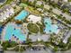 An aerial view of the community pool and amenities, offering a luxurious resort-style experience at 3150 Voyager Ave, St Cloud, FL 34771
