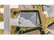 Overhead view of the house and surrounding landscape at 3259 Markward Dr, The Villages, FL 32163
