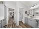 Modern bathroom with double vanity, walk-in shower, and toilet at 3259 Markward Dr, The Villages, FL 32163