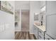 Elegant bathroom with modern vanity, walk-in shower, and glass block accents at 3259 Markward Dr, The Villages, FL 32163