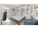 Bedroom with a Murphy bed, built-in shelving, and a TV at 3259 Markward Dr, The Villages, FL 32163