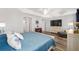 Bright and airy main bedroom with ample space and calming decor at 3259 Markward Dr, The Villages, FL 32163