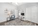 Bright and airy guest bedroom with comfortable seating at 3259 Markward Dr, The Villages, FL 32163