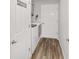 Convenient laundry room with washer, dryer, and extra storage at 3259 Markward Dr, The Villages, FL 32163