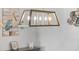 Five-light wood and metal linear chandelier at 3259 Markward Dr, The Villages, FL 32163