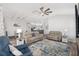 Spacious living area with comfortable seating and views to the dining area at 3259 Markward Dr, The Villages, FL 32163