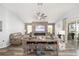 Relaxing living room features a stunning fireplace and built-in seating at 3259 Markward Dr, The Villages, FL 32163