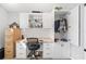 Bright office with built-in desk, cabinets, and closet at 3259 Markward Dr, The Villages, FL 32163