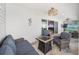 Covered patio with seating area and fire pit feature at 3259 Markward Dr, The Villages, FL 32163