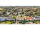 Aerial view of houses in a residential neighborhood at 3525 Idlewood Loop, The Villages, FL 32162