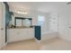 Elegant bathroom with a soaking tub and double vanity at 410 Cheeota Ct, Minneola, FL 34715