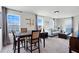Bright bonus room with a table and comfortable seating at 410 Cheeota Ct, Minneola, FL 34715