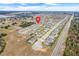 Aerial view of house and surrounding neighborhood at 410 Cheeota Ct, Minneola, FL 34715