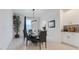 Elegant dining room with a modern table and chairs at 410 Cheeota Ct, Minneola, FL 34715