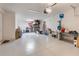 Spacious garage with overhead storage and ample space at 410 Cheeota Ct, Minneola, FL 34715
