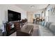 Spacious living area with large TV and ample seating at 410 Cheeota Ct, Minneola, FL 34715