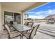 Covered patio with glass table and chairs, overlooking the pool at 410 Cheeota Ct, Minneola, FL 34715