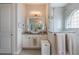 Spa-like bathroom with walk-in shower and double vanity at 5072 Greens Dr, Lady Lake, FL 32159
