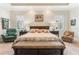 Luxurious Primary bedroom, featuring a king-size bed and plenty of light at 5072 Greens Dr, Lady Lake, FL 32159