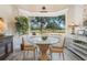 Breakfast nook with a view of the backyard and seating for four at 5072 Greens Dr, Lady Lake, FL 32159