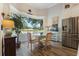 Breakfast nook with a view of the backyard through a large window at 5072 Greens Dr, Lady Lake, FL 32159