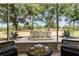 Relaxing screened patio with fountain view and ample seating at 5072 Greens Dr, Lady Lake, FL 32159