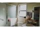 Updated bathroom with shower, vanity, and ample storage at 5622 Sir Churchill Dr, Leesburg, FL 34748