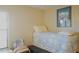Charming bedroom with window and comfortable bedding at 5622 Sir Churchill Dr, Leesburg, FL 34748