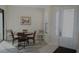 Bright dining area with table and chairs near entryway at 5622 Sir Churchill Dr, Leesburg, FL 34748