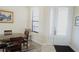 Casual dining area with table and chairs near entry at 5622 Sir Churchill Dr, Leesburg, FL 34748