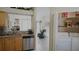 Kitchen boasts granite countertops, stainless steel appliances, and ample cabinetry at 5622 Sir Churchill Dr, Leesburg, FL 34748